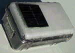 SPOT tracker in a Pele box with small solar panels on outside