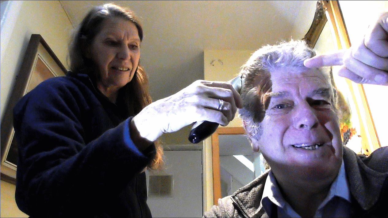 June cutting Robin Lovelock's hair but not the Love Lock :-)
